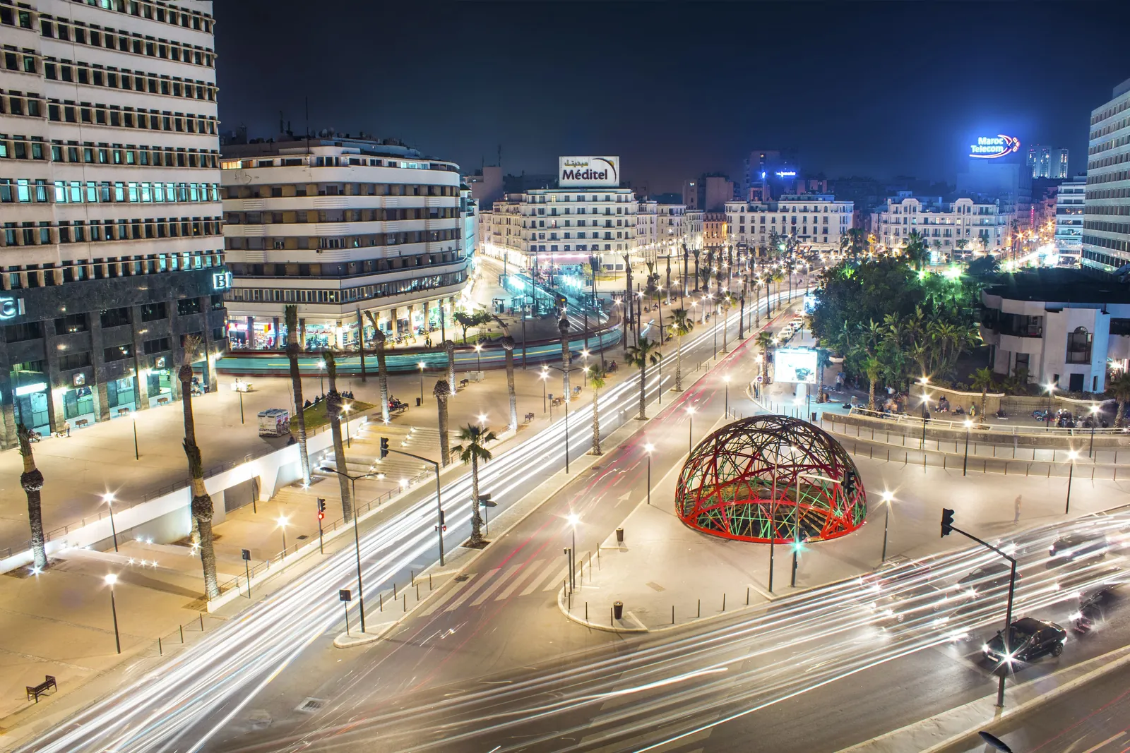 Downtown Casablanca at night with light trails along the avenues.